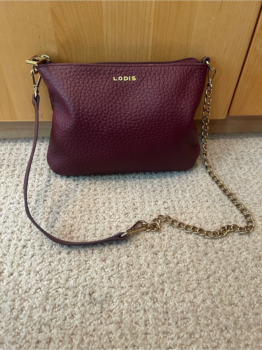LODIS Pebbled Leather Crossbody in Wine with Gold Chain